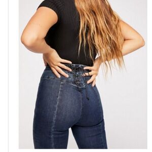 We the Free Curvy lace up back bell bottom jeans